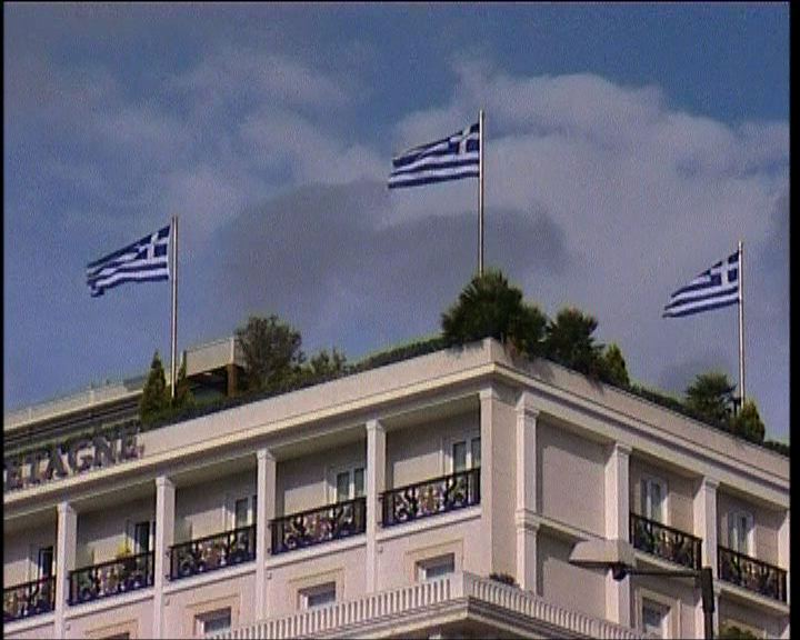 
德法稱要盡快解決希臘債務