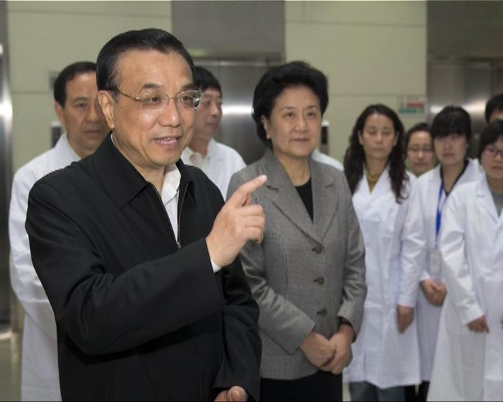 
總理李克強到中國疾控中心考察