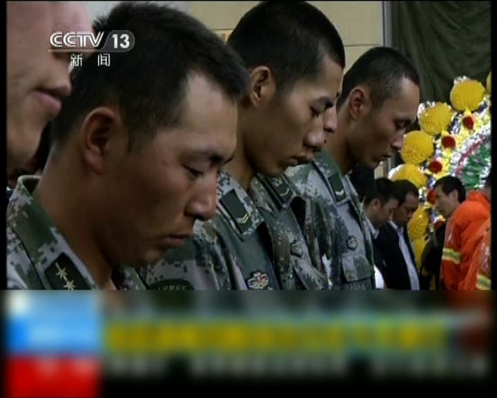 
甘肅舉行儀式悼念地震死難者