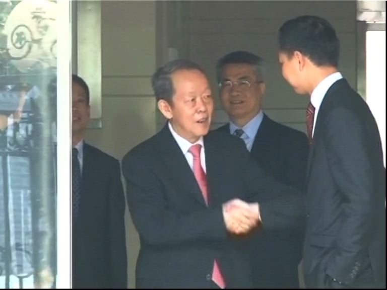 大律師公會訪京　王光亞與郭榮鏗握手