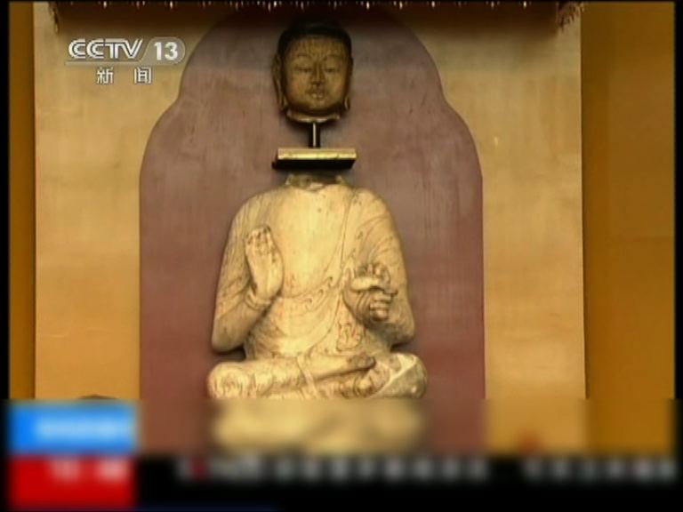 北齊漢白玉佛像在台灣身首合璧