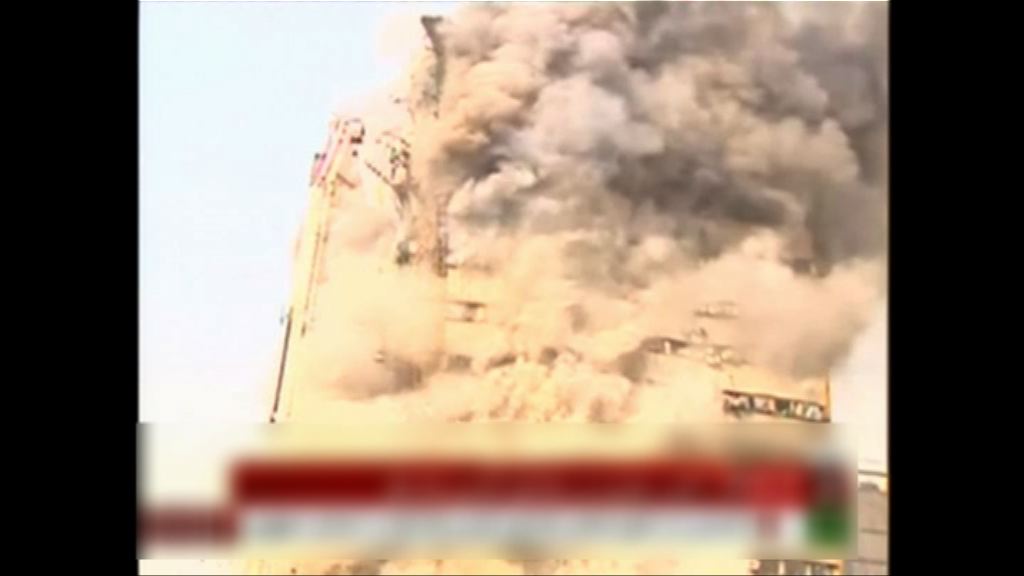 伊朗一幢大廈起火後倒塌30死