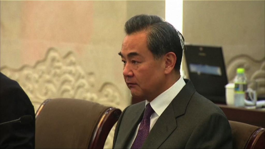 外長王毅指李波為中國公民