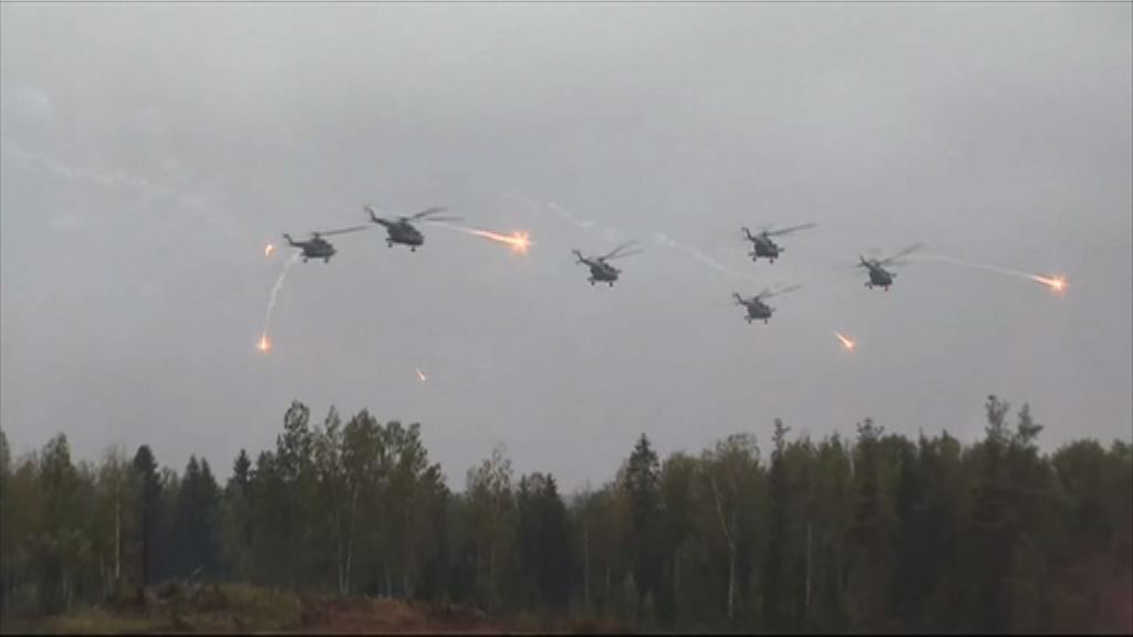 俄軍直升機演習期間向地面開火　三人傷
