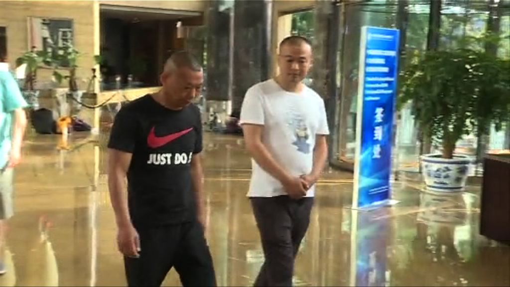 有指毆打香港記者兩男子為四川當地官員